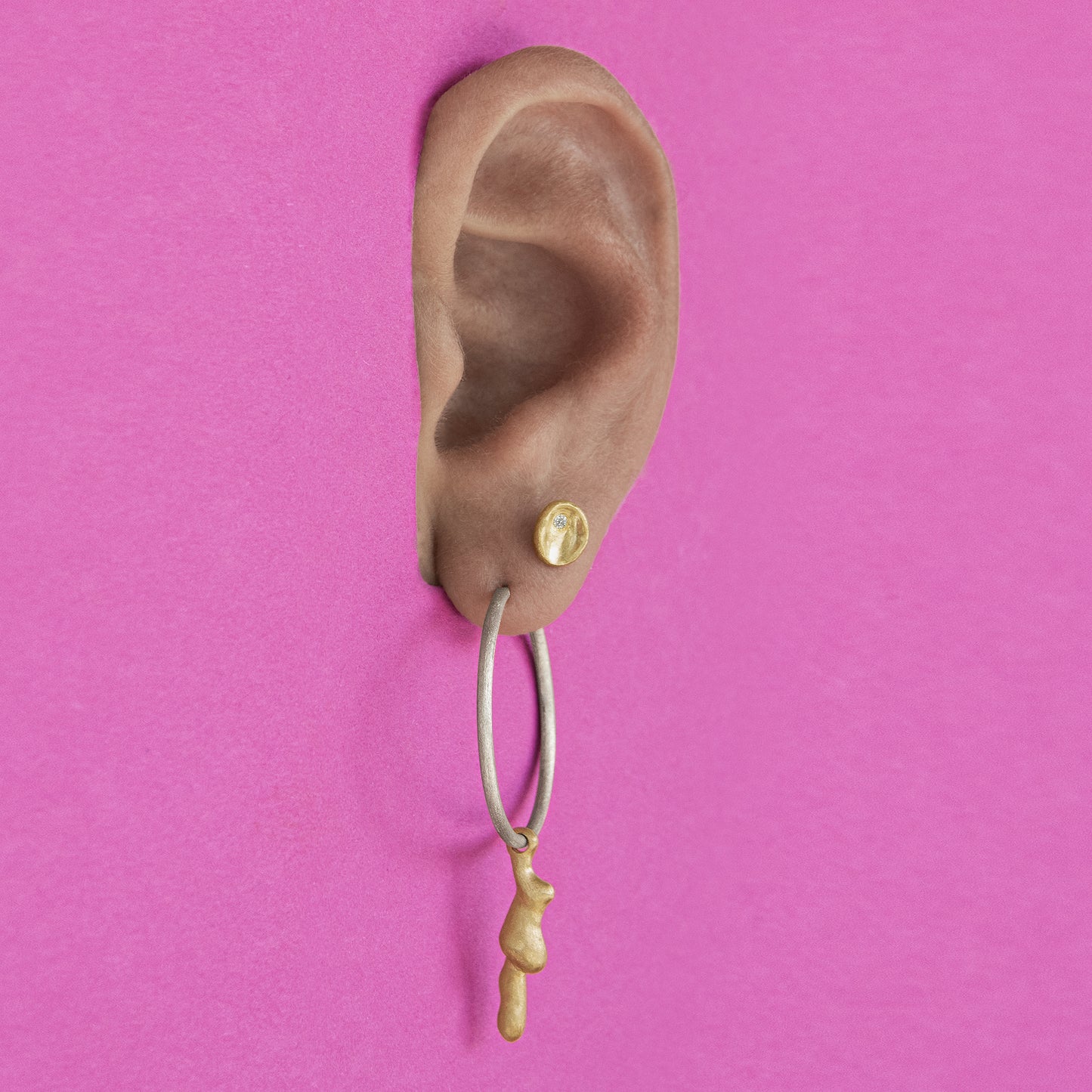 medium silver hoop with gold molten charm